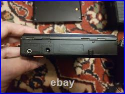 1986 Sony D-55T Discman & BP200 Portable CD Player with FM/AM/TV