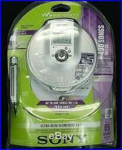 BRAND NEW SONY WALKMAN D-NE900 MP3 ATRAC3 CD with charging stand RARE