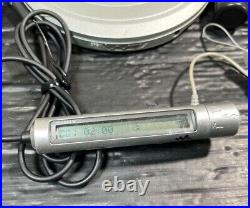 SONY D-EJ1000 CD Walkman Portable CD Player Remote AC adapter Stand Silver Used