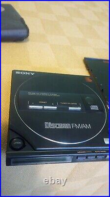 SONY Discman Model D-T10 FM/AM CD Player With BD-100 Battery Pack And Carry Case