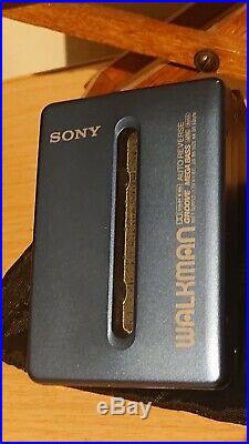 Sony WM-EX674 Walkman, remote, headphones, battery pack, charger